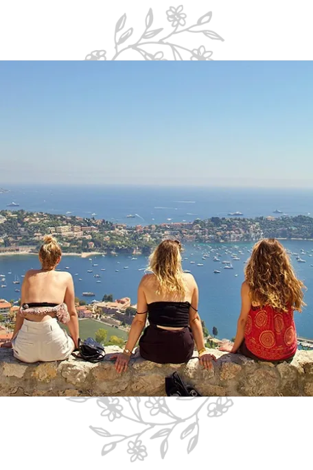 Three friends looking out over the sea