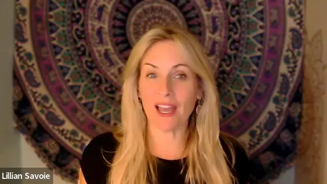 Lillian Savoie on a live Zoom webinar, in front of her purple mandala tapestry